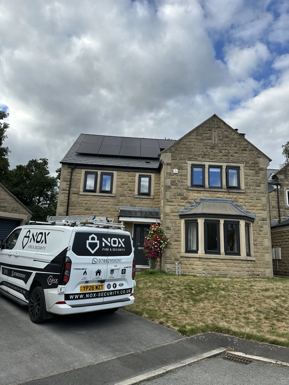 Stone-built Bakewell property with NOX van during security installation
