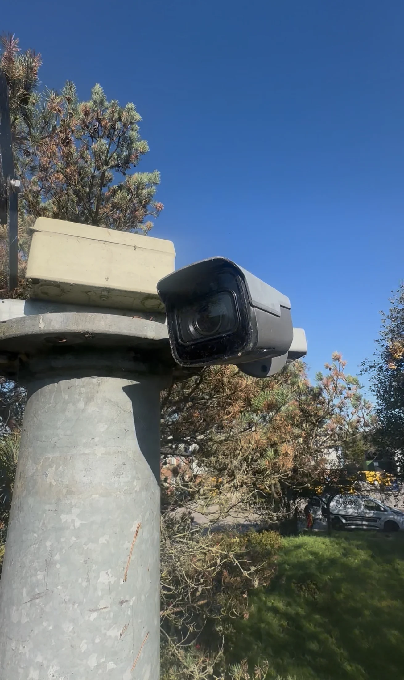 Hikvision fixed bullet CCTV camera mounted on a yard column
