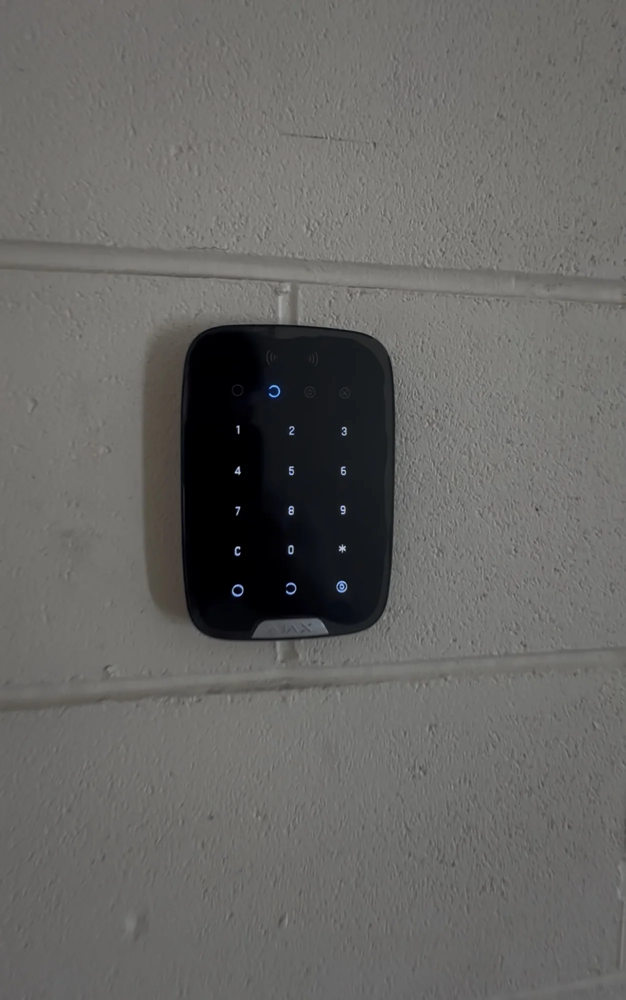 Black Ajax security keypad fitted to the commercial premises
