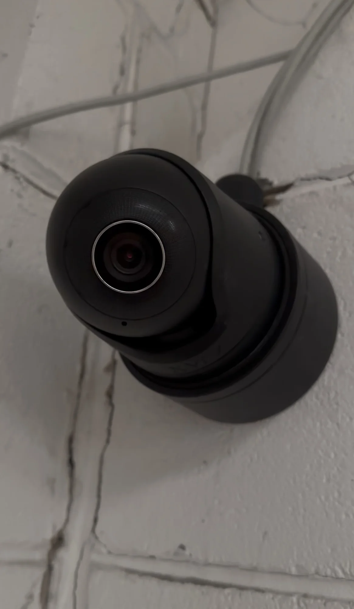 Black CCTV camera installed on the David Malin Kitchens exterior