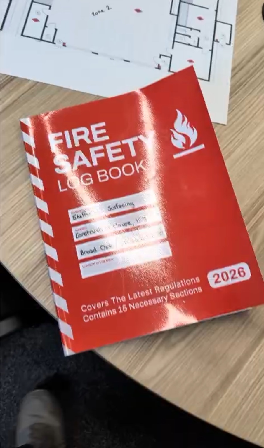 Fire safety logbook and system plans used for commercial compliance records