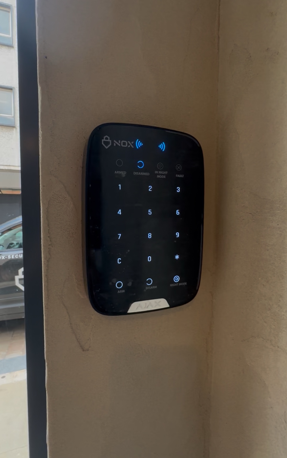 NOX branded Ajax keypad installed at The Tan Station